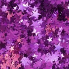 a colorful pink backdrop of metallic confetti star shapes